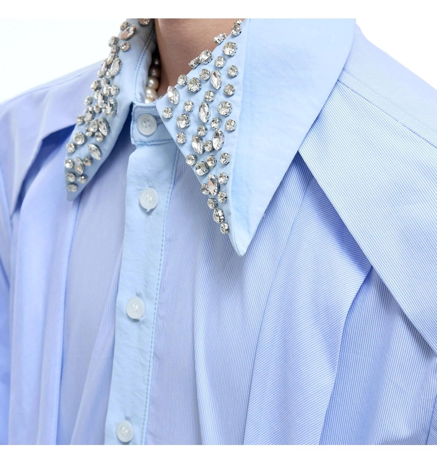 Close-up of blue striped cotton dress shirt with pearl and rhinestone embellished double collar and long tie detail