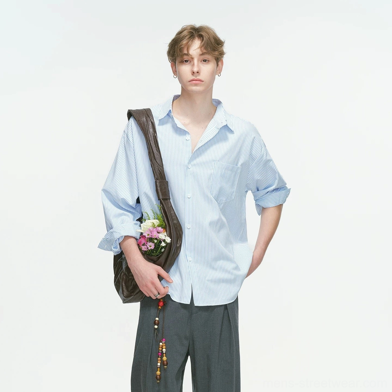 Blue vertical stripe relaxed overshirt variation with oversized fit, button front, pointed collar, and modern Seoul streetwear character