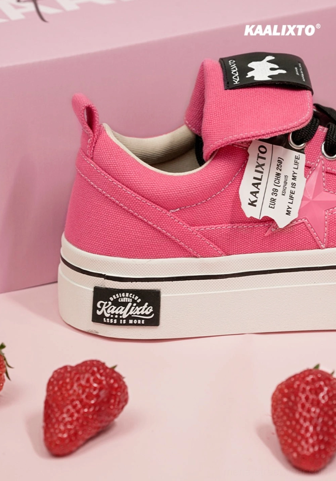 Bright pink canvas platform sneakers with star side overlay, Velcro tongue strap, and graphic streetwear silhouette