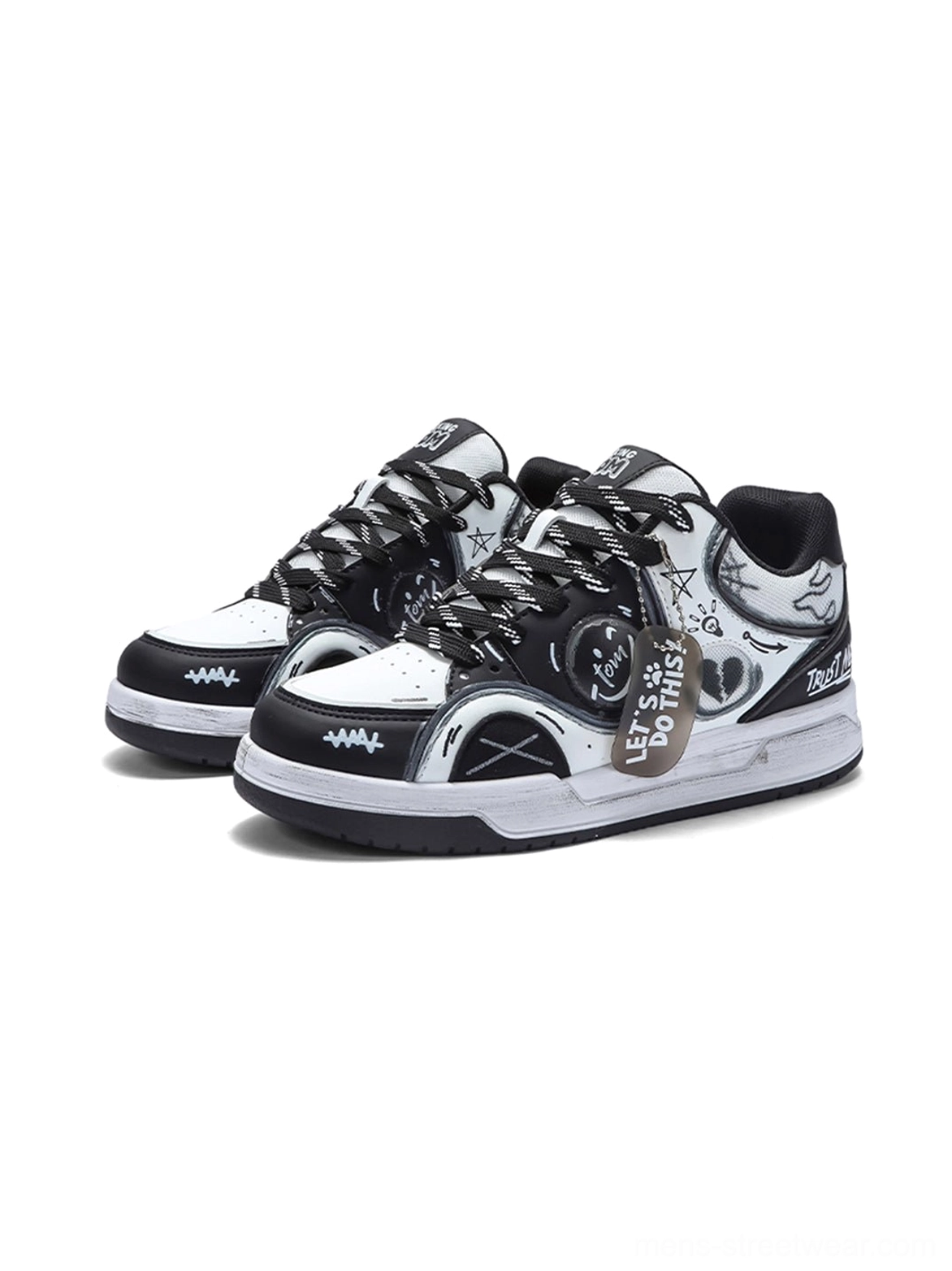 Graphic low-top streetwear sneakers featuring playful heart artwork, contrast laces, and layered panels