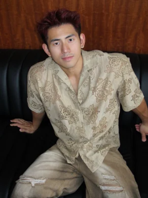 Men's brown floral sheer camp collar shirt front view with relaxed oversized fit and baroque botanical pattern