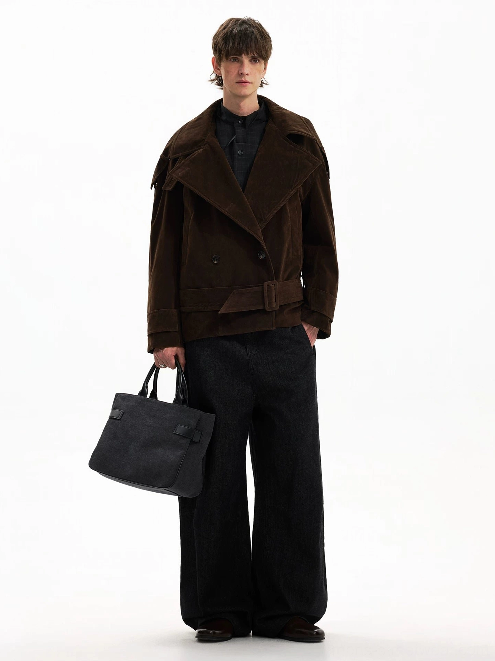 Brown belted cropped trench coat in textured corduroy with wide lapels and relaxed silhouette