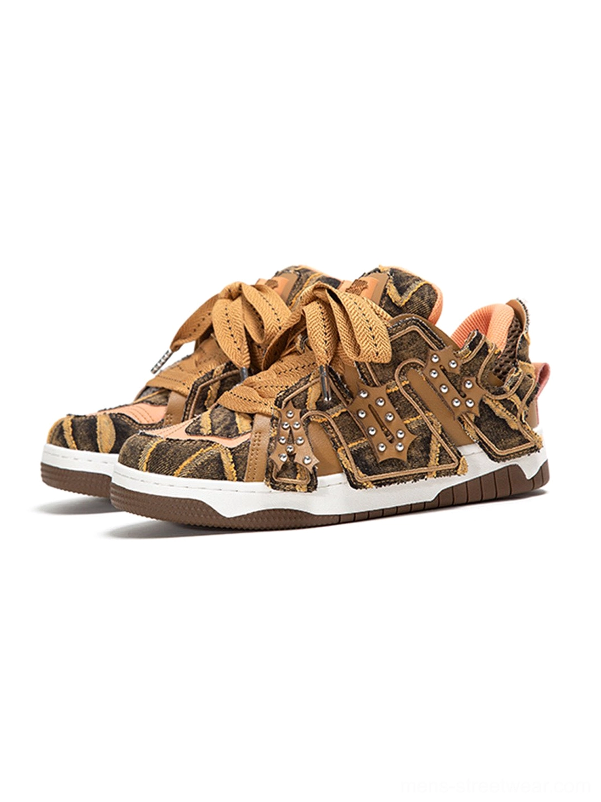 Pair of brown camouflage rivet platform skate sneakers showing dual laces distressed texture and thick white midsole