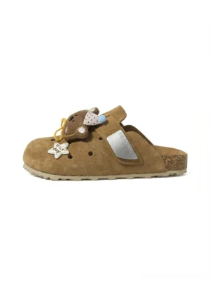 Side profile of brown charm embellished perforated clogs with suede look microfiber upper metal buckle strap and cork style sole