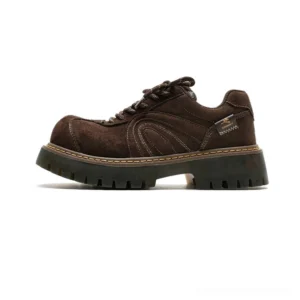 Brown chunky suede-effect work sneakers with contrast stitching, rounded toe, platform lug sole, and rugged streetwear design on a white studio background