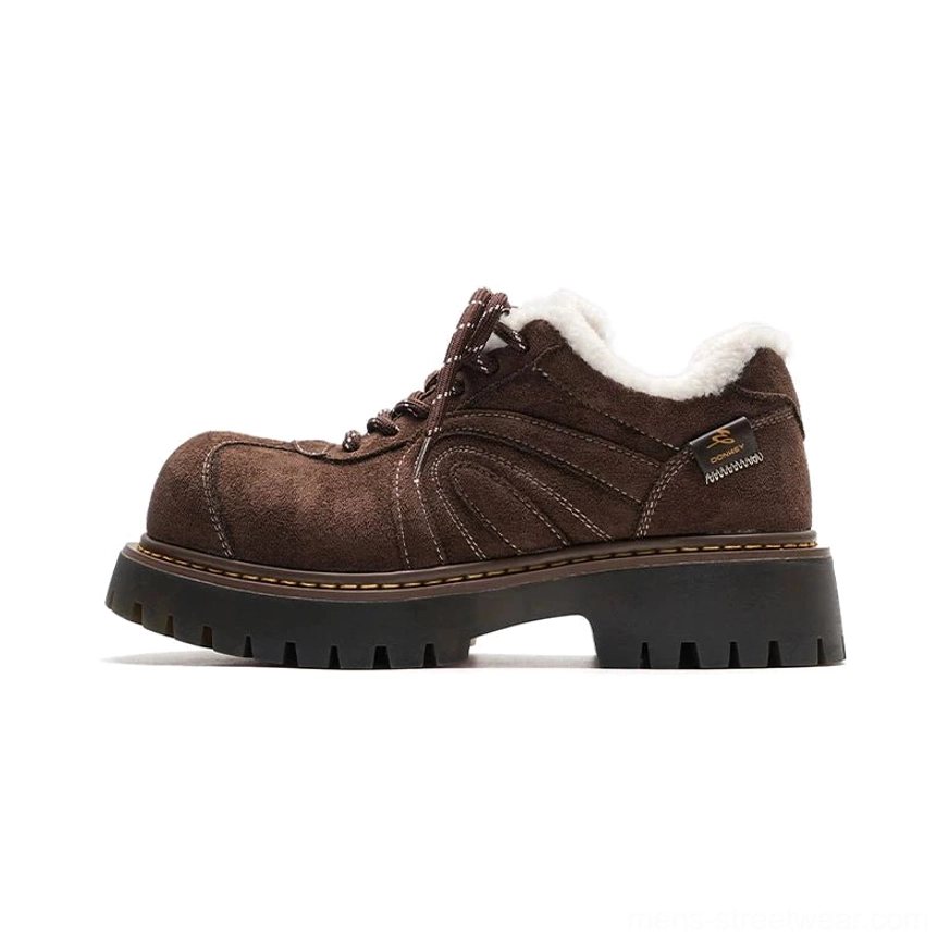 Brown chunky suede-effect sneakers with a soft plush-lined collar, elevated platform profile, and thick rubber lug sole on a white background