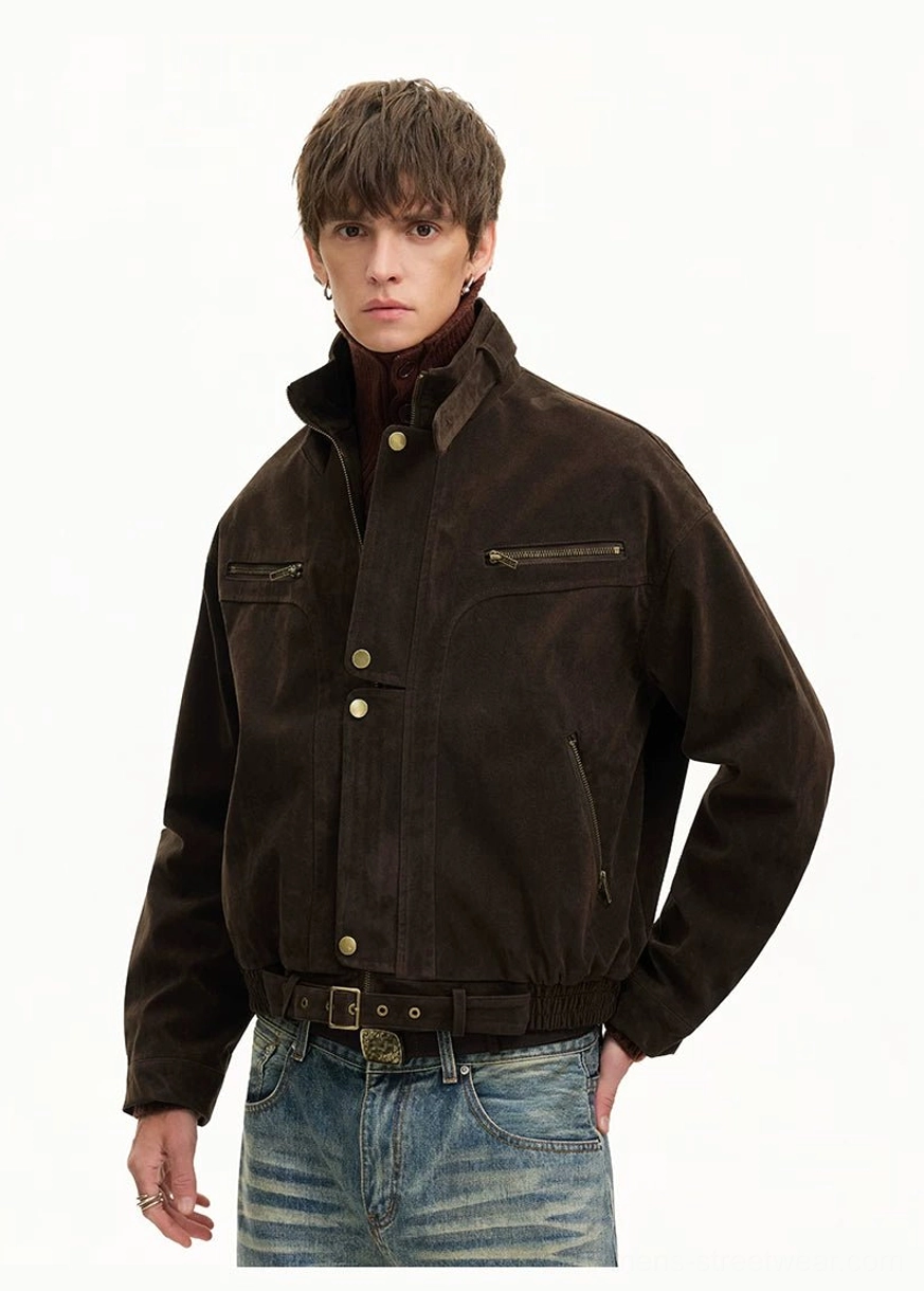 Brown corduroy utility bomber jacket three-quarter side view showing chest zip pockets sleeve patch and waist strap
