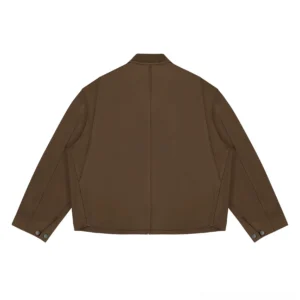 Brown cropped workwear jacket back view showing clean center seam adjustable cuffs and boxy fit
