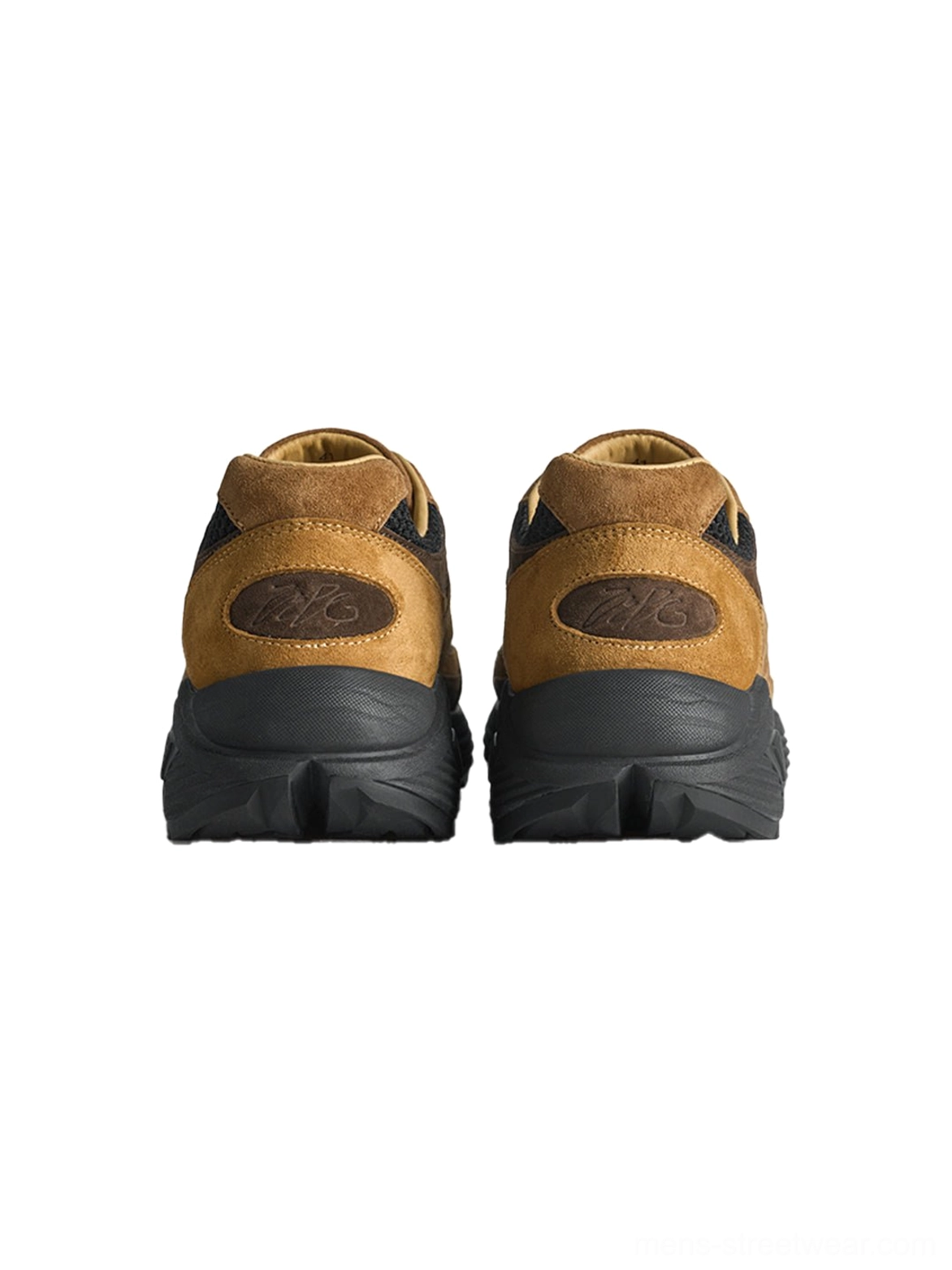Brown distressed suede trail runner sneakers with cream lace-up front black mesh panels and rugged molded outsole