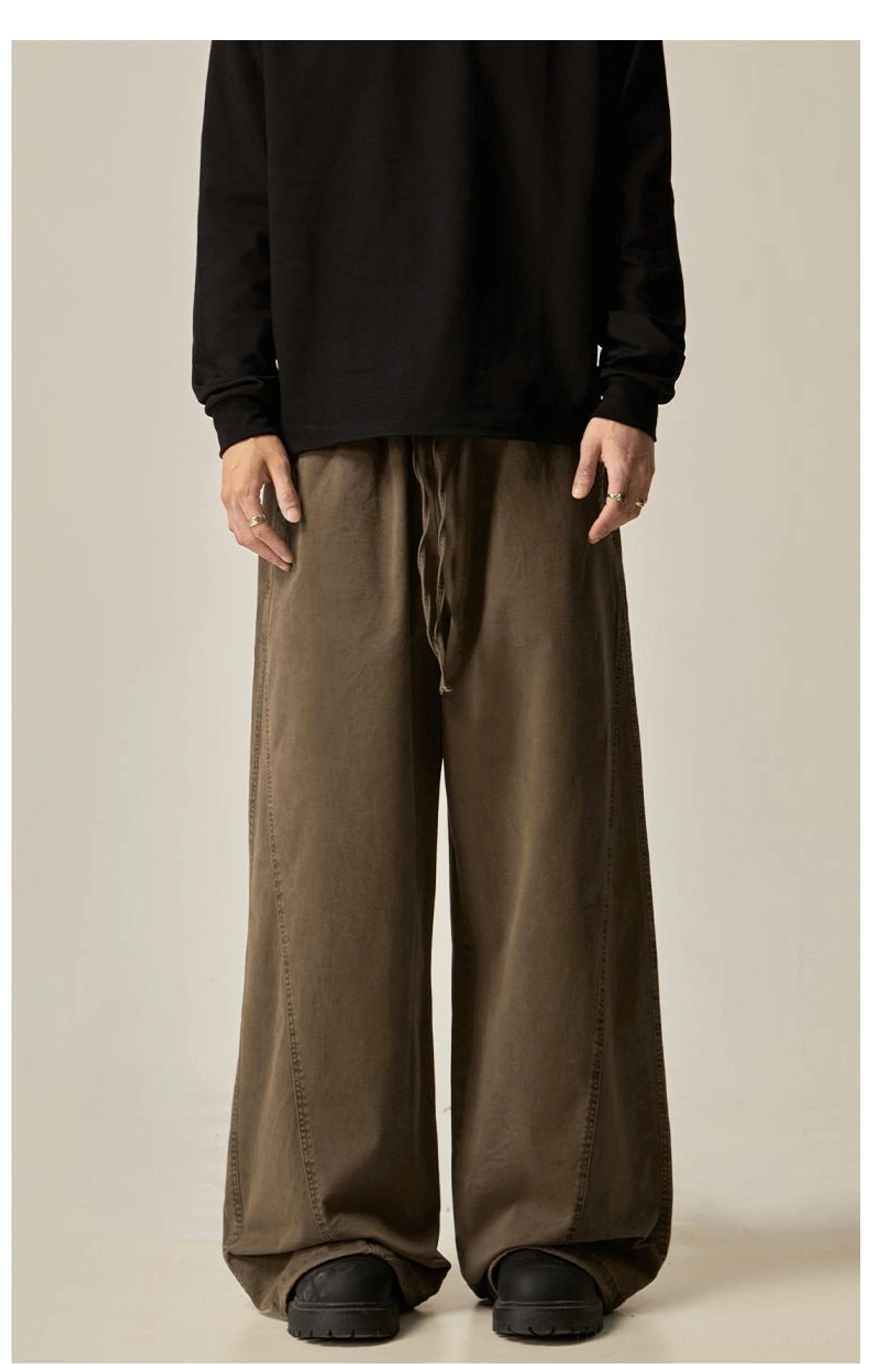 Brown wide-leg drawstring pants front view male model black tee drawstring waist structured side seams vintage washed finish