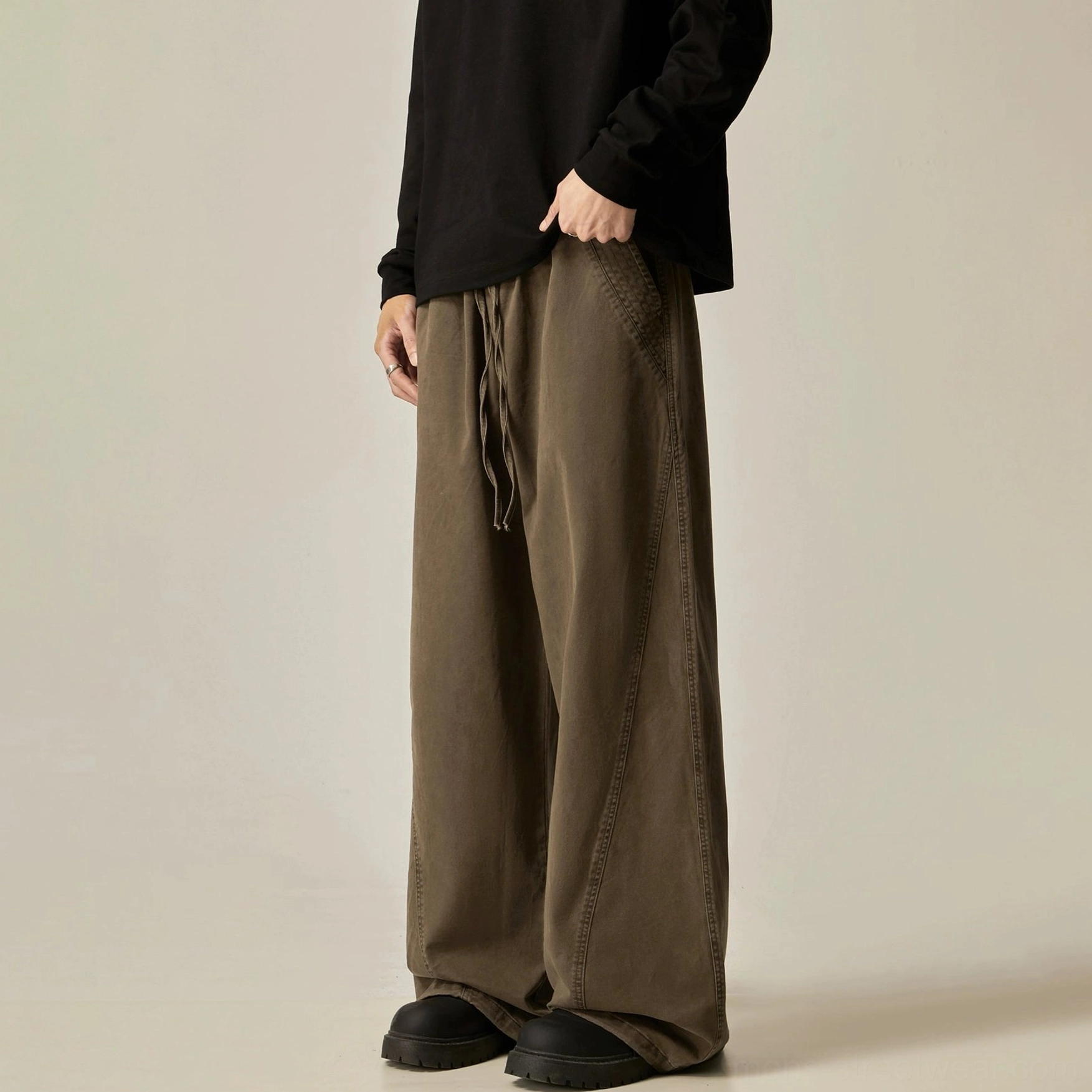 Brown drawstring wide-leg pants floor-length hem washed brown fabric vintage tone pooling relaxed oversized silhouette