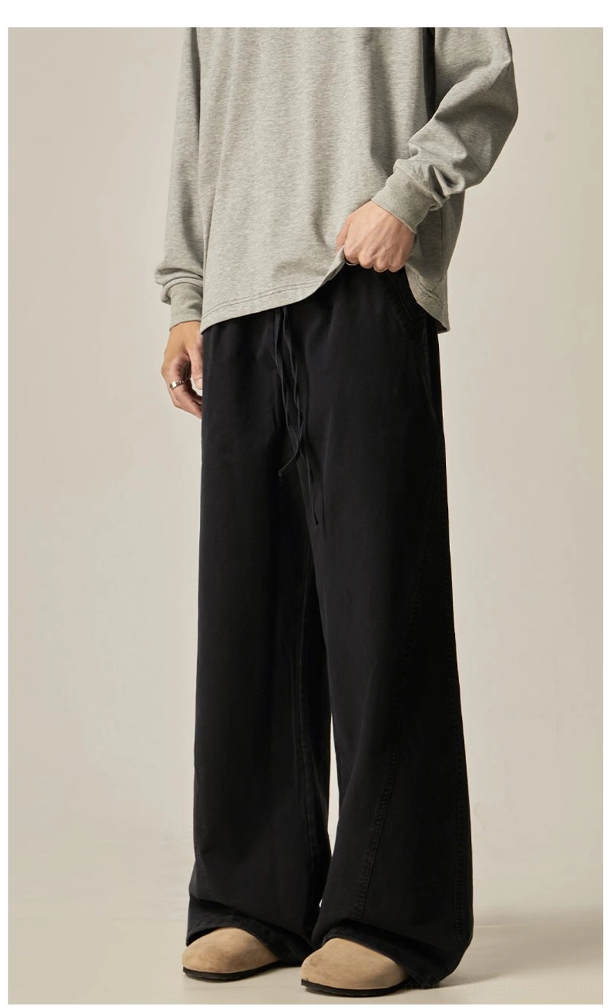 Brown drawstring wide-leg pants pocket detail functional side slip pocket practical streetwear design quality stitching