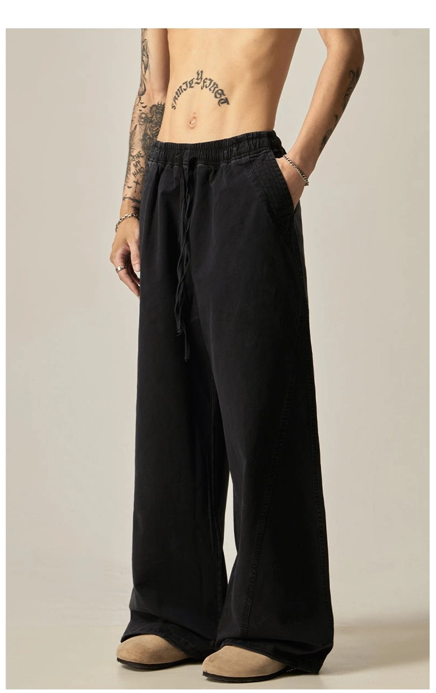 Brown drawstring wide-leg pants detail shot drawstring waist mechanism elastic closure functional design streetwear practical