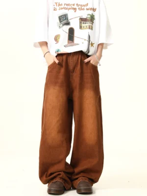 Brown Korean streetwear wide leg jeans showing relaxed fit side pockets and elasticated back waistband