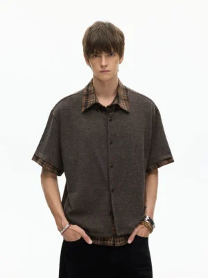 Brown layered plaid hem knit shirt with exposed checked collar and hem styled with black wide-leg pants