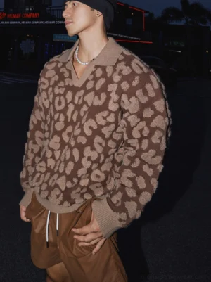 Brown leopard print polo knit sweater with fuzzy jacquard texture, oversized drop shoulder fit, black beanie styling, and urban Korean streetwear look