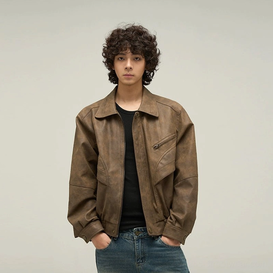 Brown oversized faux leather streetwear jacket showing the classic vintage-inspired outerwear design and matte finish