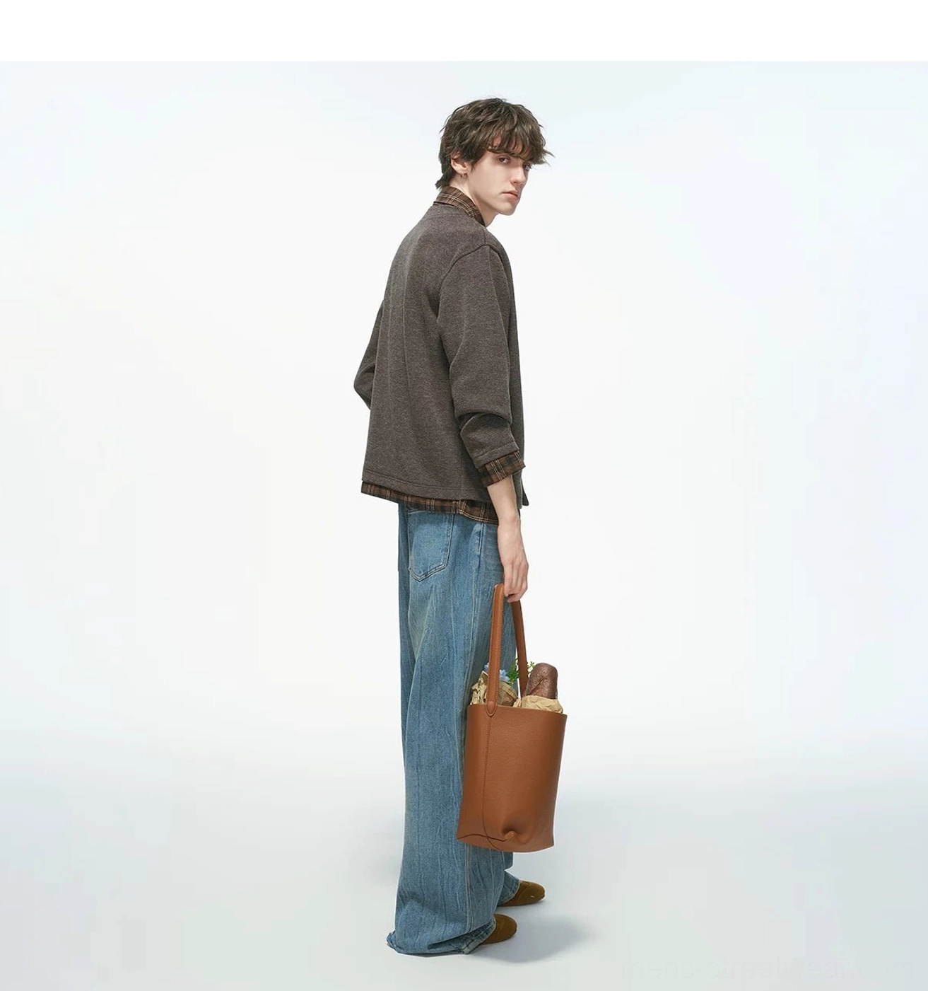 Brown plaid collar knit shirt jacket shown from the right side with a leather tote bag in casual Korean fashion styling