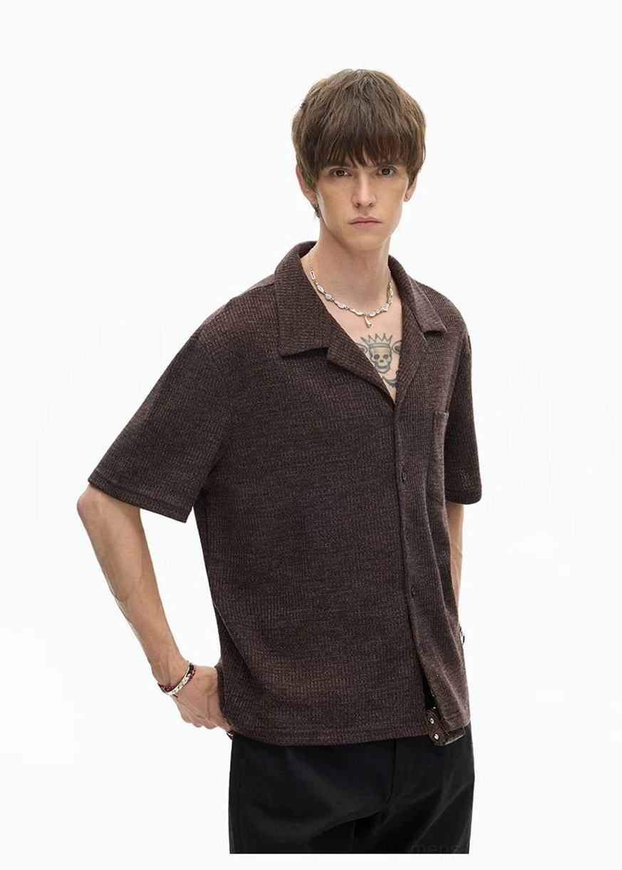 Brown relaxed camp collar shirt worn partially unbuttoned to show the textured fabric and casual Korean streetwear silhouette