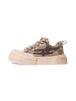 Brown smile panel platform sneakers in a three-quarter studio view with layered tonal upper panels, thick woven laces, lightning-shaped side detail, and chunky cream outsole