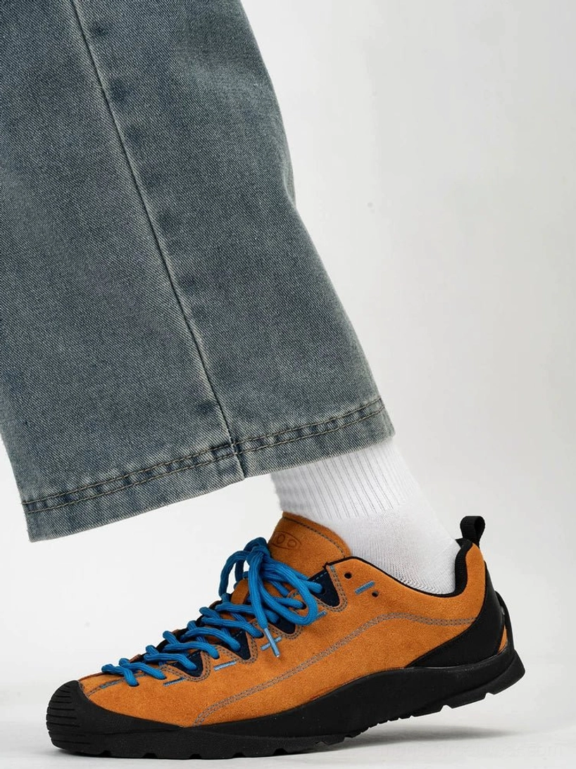 Brown suede retro hiking sneakers with vivid blue round laces black protective toe bumper and durable rubber outsole