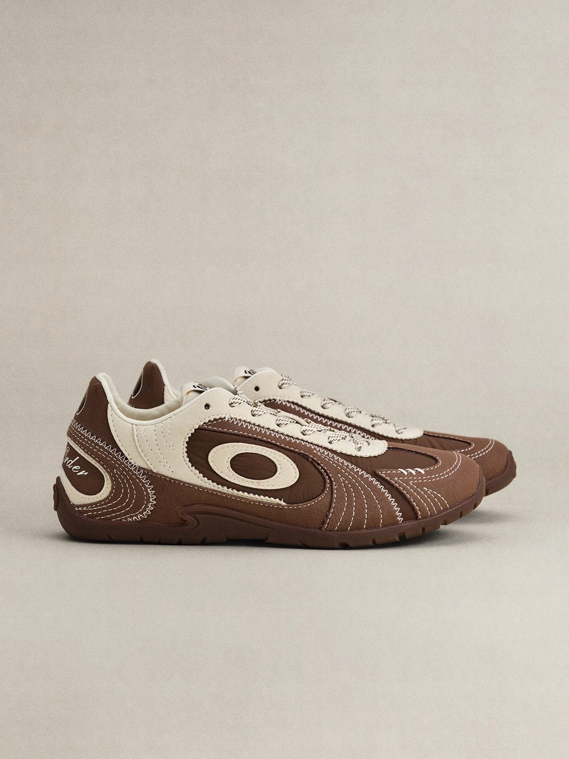 Brown swirl panel retro trainers with cream overlays, contrast laces, rounded toe and slim gum sole