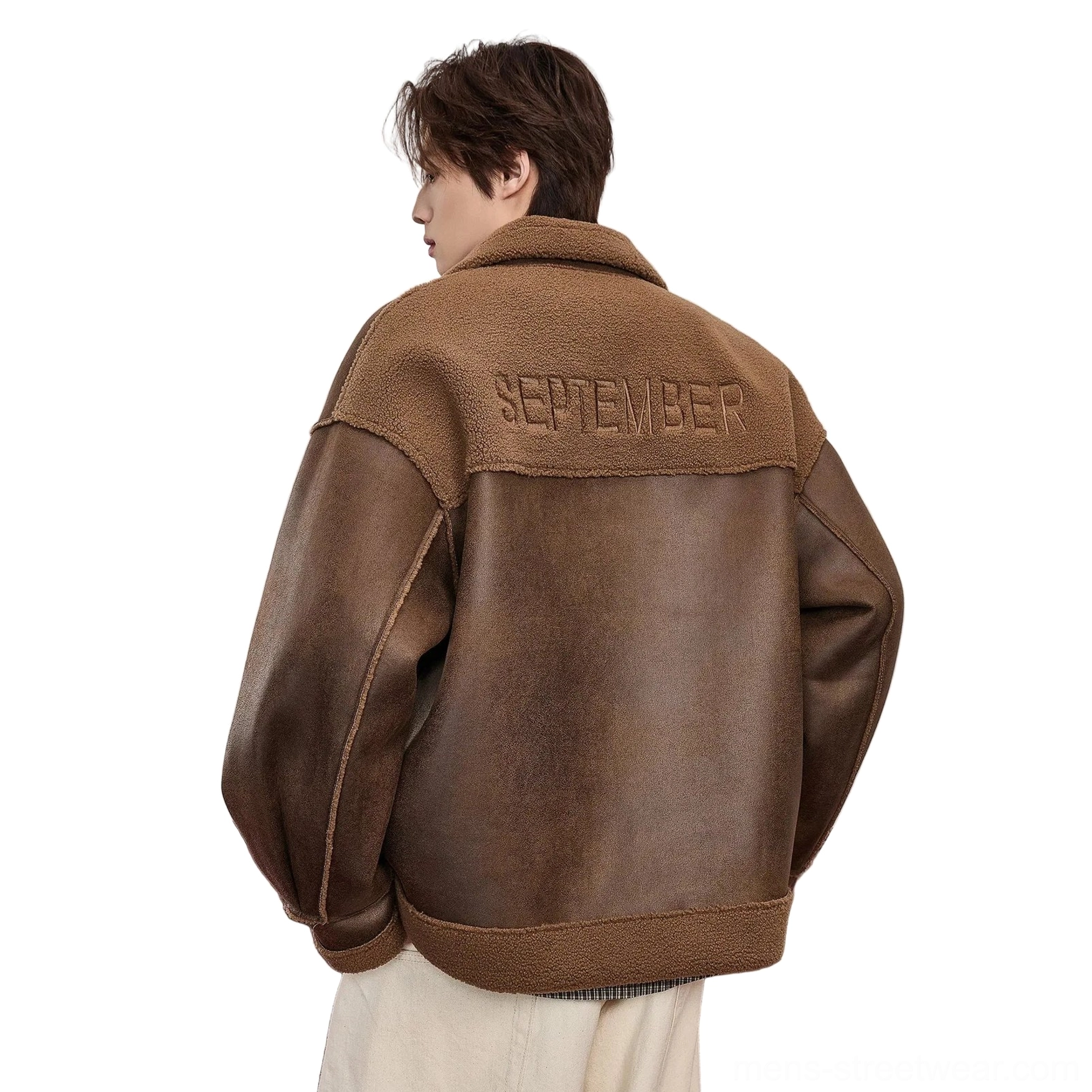 Brown two-tone faux shearling aviator bomber jacket for men shown from the back with faux leather body, shearling shoulder yoke, cropped silhouette, and embossed SEPTEMBER lettering