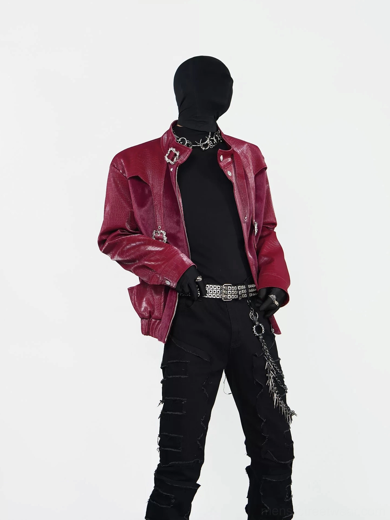 Front view of a burgundy crocodile embossed PU faux leather punk jacket with silver buckle harness straps, stand collar, black streetwear styling and relaxed cropped silhouette