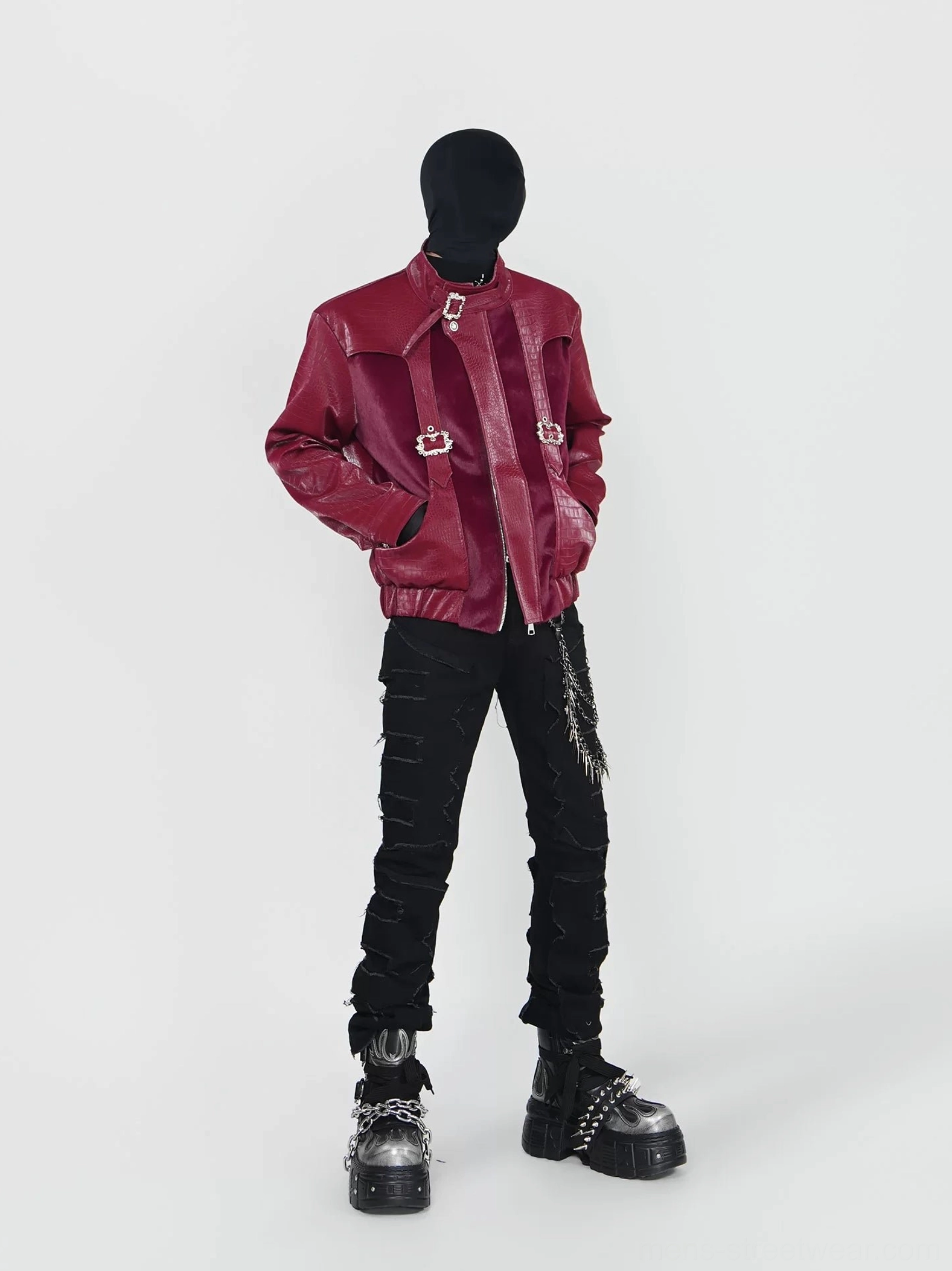 Full front view of burgundy crocodile embossed leather look jacket featuring silver buckle harness details, side pockets and loose avant-garde streetwear silhouette