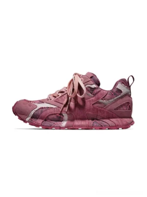 Burgundy urban camo runner sneaker shown in side profile with woven fabric panels, split leather accents, lace-up fastening, and rear heel pull tab