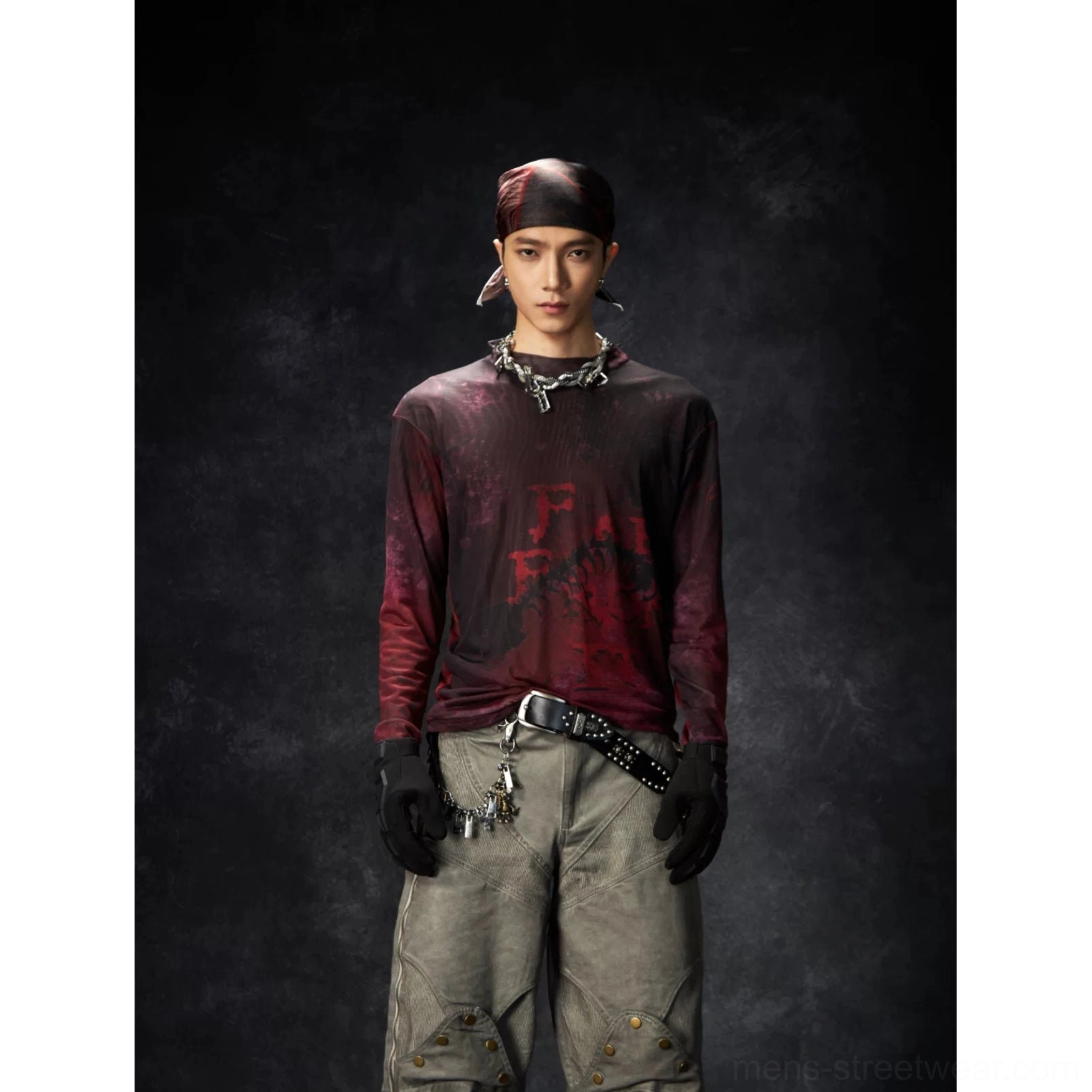 Burgundy washed grunge graphic long sleeve streetwear tee shown from the front with faded red artwork