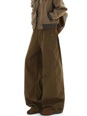 Brown ultra-wide workwear denim pants rear three-quarter view showing structured wide-leg Seoul streetwear fit