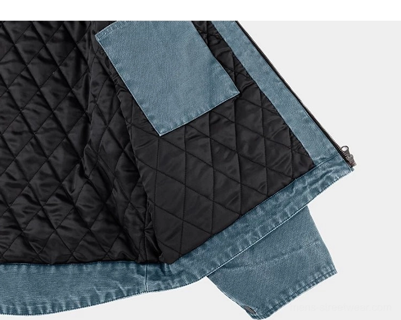 Casual cotton work jacket with relaxed shoulders, full zipper front, corduroy collar, and oversized patch pockets