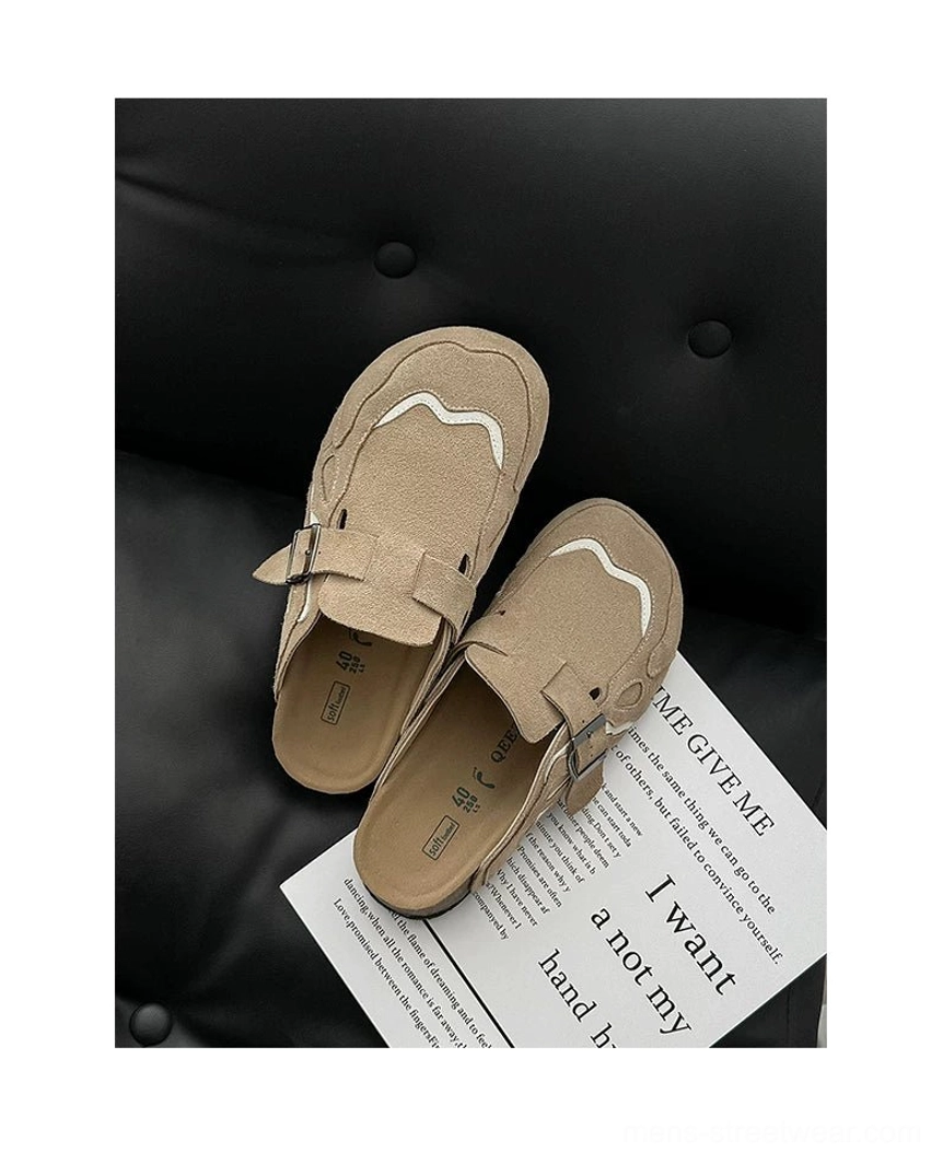 Casual suede mule clogs featuring organic curved overlays, contrast stitching, and a grounded composite sole