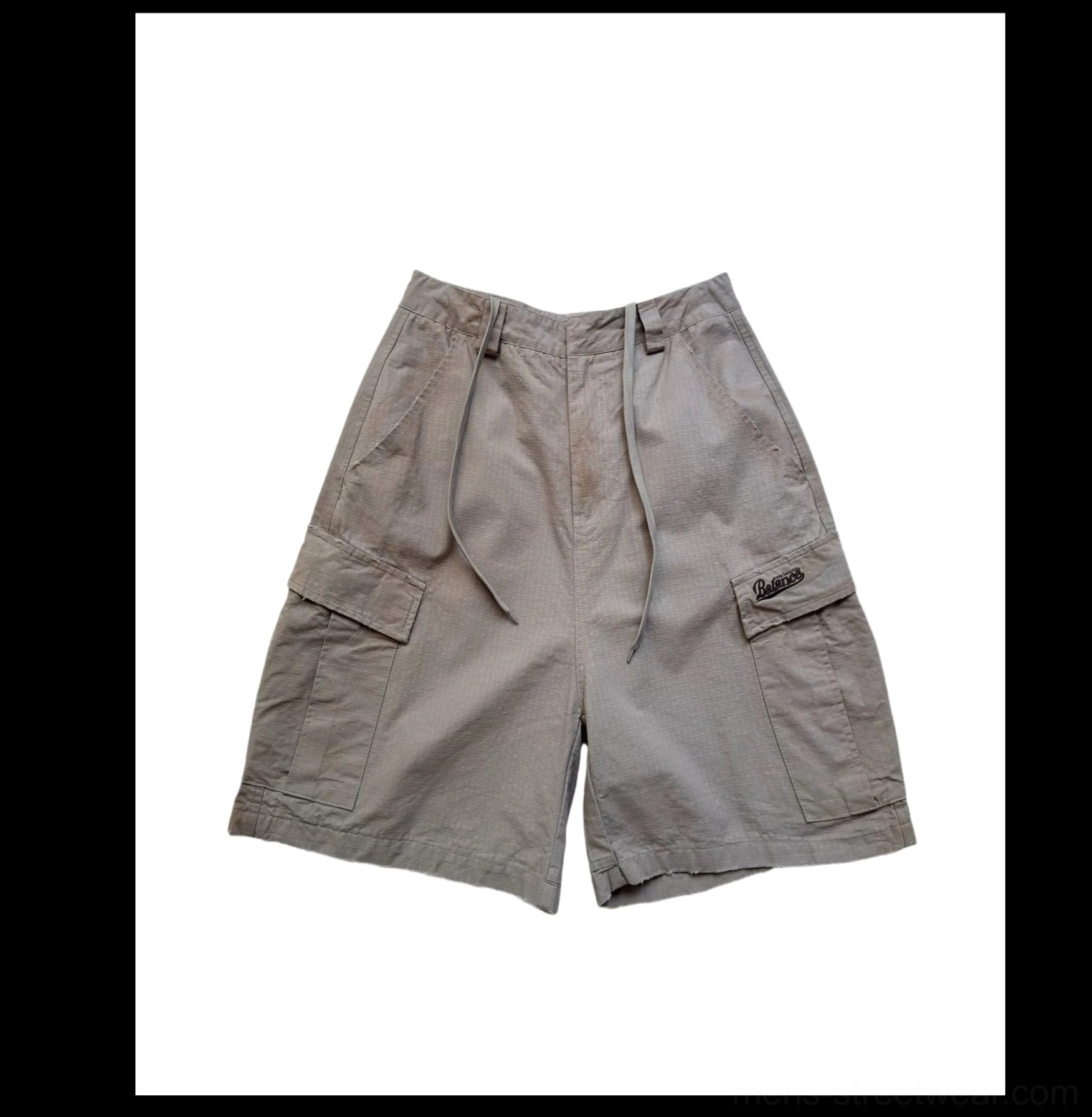 Flat lay front view of cement ash cotton grid cargo culottes with zip button closure and flap side cargo pockets