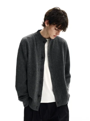 Charcoal gray men's knit cardigan styled with a white undershirt and black trousers for minimalist Seoul streetwear