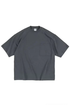 Dark charcoal gray oversized pocket T-shirt with relaxed crew neck, short dropped sleeves, and minimalist Korean streetwear silhouette