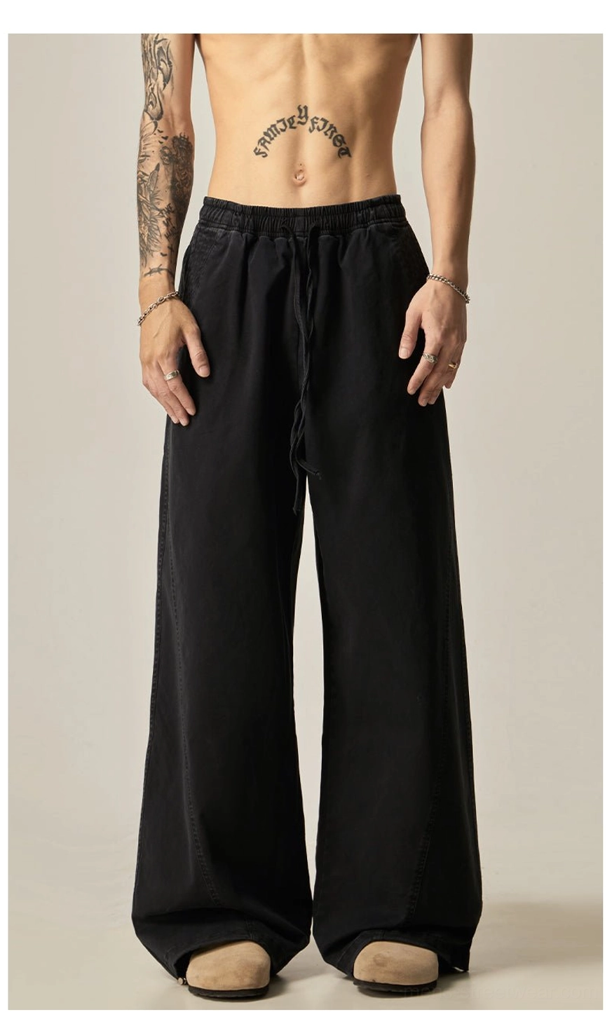 Charcoal grey drawstring wide-leg pants back view washed dark grey fabric relaxed fit contemporary korean fashion inspired