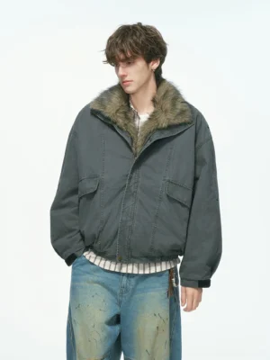 Front close-up of a charcoal grey faux fur collar parka jacket with dropped shoulders elasticated hem and oversized Korean streetwear fit