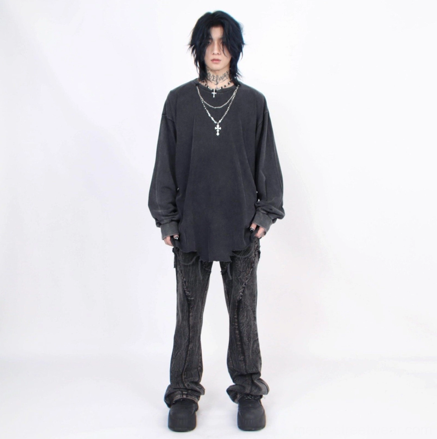 Charcoal oversized distressed crew neck long-sleeve tee with single cross pendant and raw hem