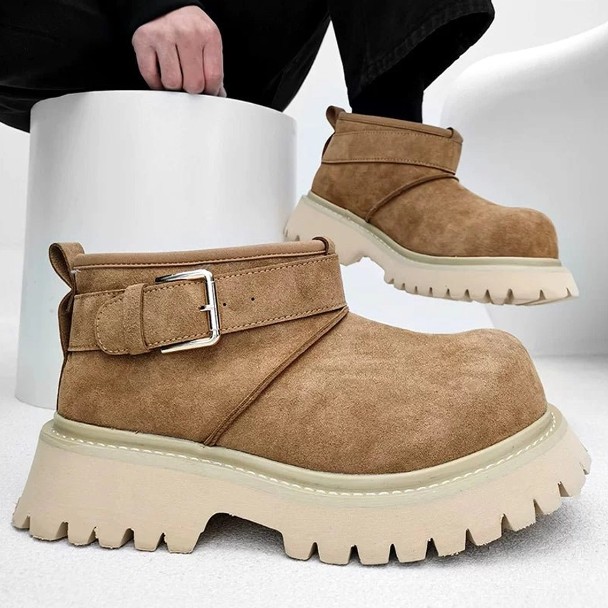 Chestnut brown fleece-lined chunky ankle boots with silver buckle strap, rounded toe, and thick beige lug platform sole