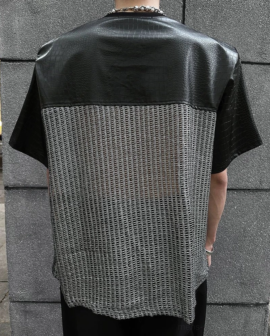 Black and silver chrome grid patchwork T-shirt with drop shoulders, crew neckline, textured panel construction, and avant-garde streetwear appeal