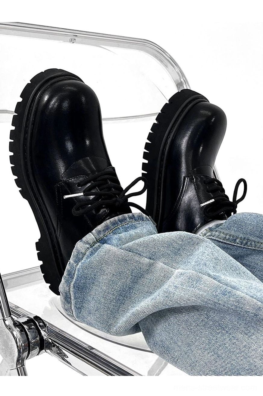 Chunky black platform derby shoes in matte or glossy finish for Korean streetwear and modern alternative outfits
