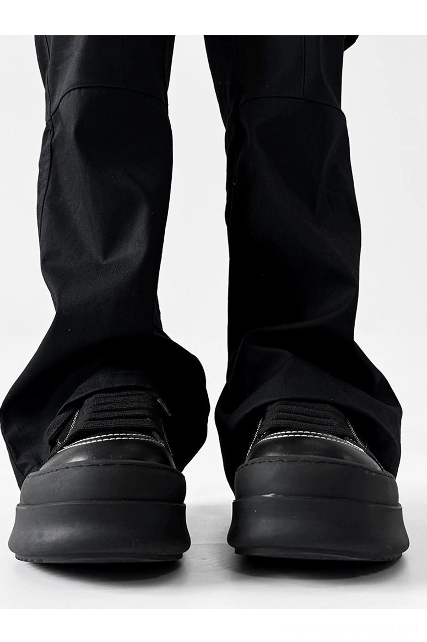 Chunky platform streetwear sneakers with contrast panel design and elevated sole detail