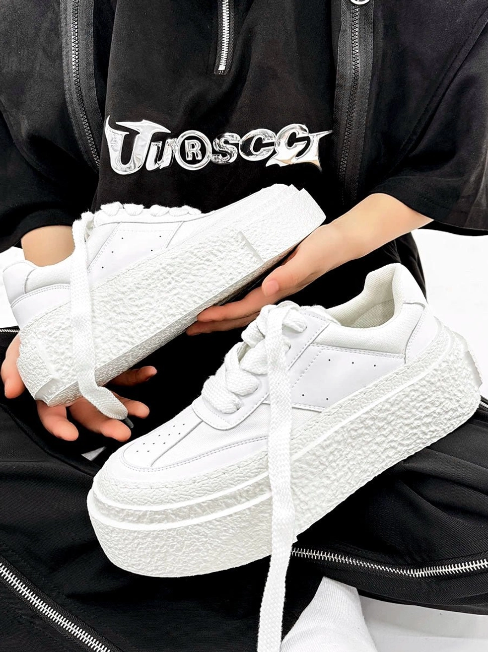 Chunky textured platform shoes with oversized proportions for modern urban and East Asian streetwear