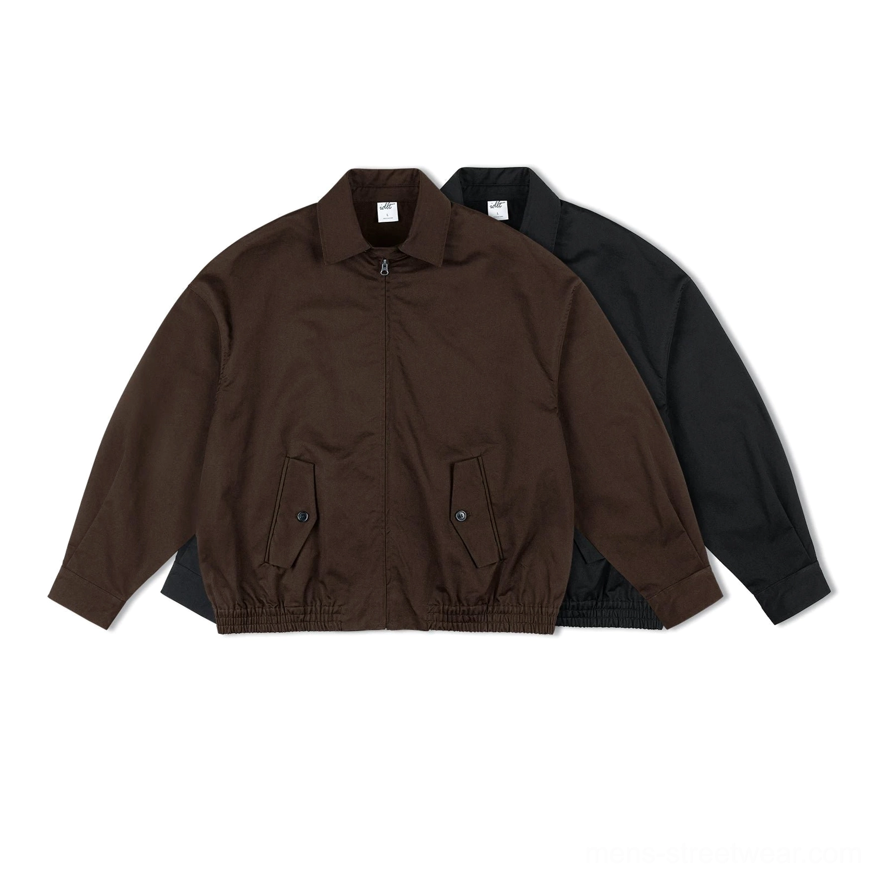 Front flat lay of a classic cotton Harrington jacket in black and dark coffee brown with a relaxed boxy Korean streetwear silhouette, spread collar, full zipper, flap pockets, and elasticated hem