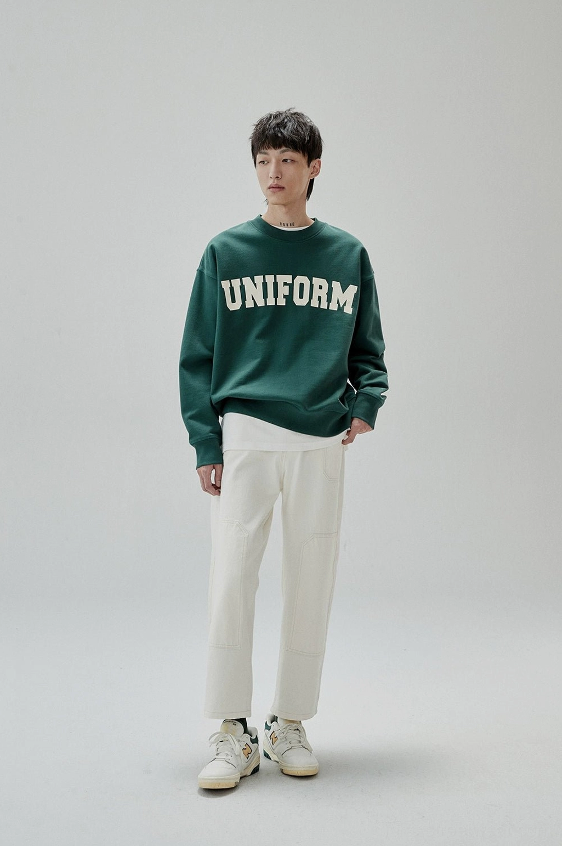 Classic crewneck sweatshirt updated with retro collegiate lettering and relaxed streetwear proportions