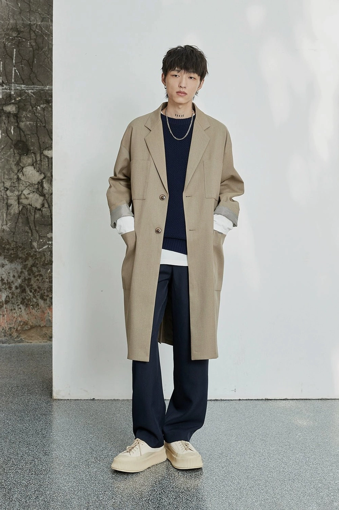 Classic tailored trousers reworked with a relaxed wide-leg silhouette and streetwear attitude