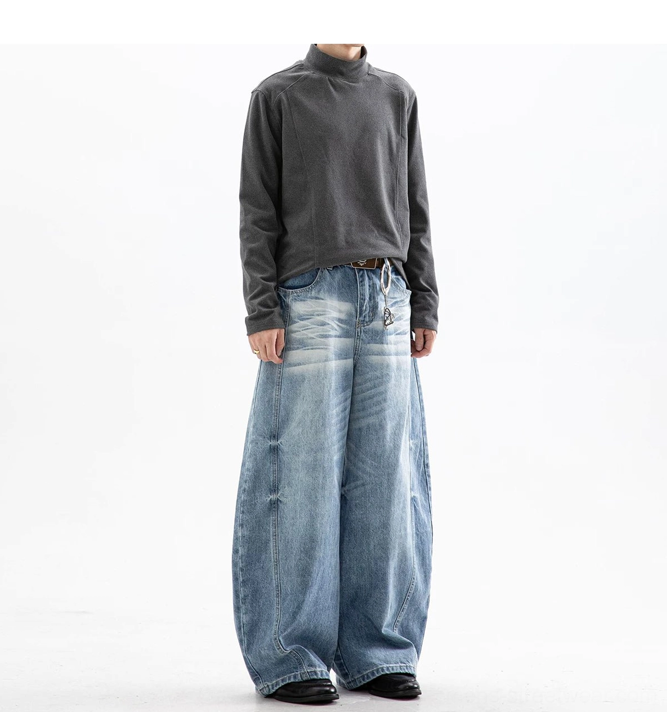Cloud washed ultra wide leg jeans featuring vintage fading and long stacked streetwear proportions