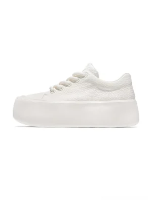 White full-grain leather platform sneakers in left side profile with chunky elevated sole